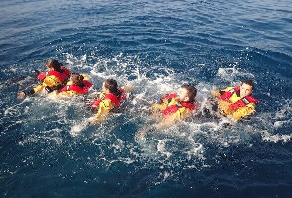 Image of flotation devices for adults learning to swim